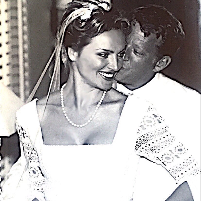 Eva Halina Rich and her husband of two decades Christopher Rich took a picture together on their wedding day.